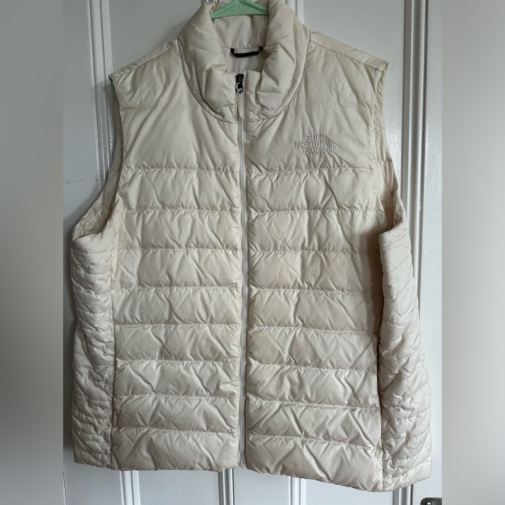 North face xxl white puffer vest down. Small pen mark on front, otherwise great